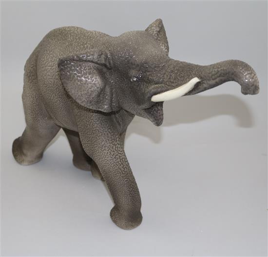 Sevres Vinsare model of a trumpeting elephant(-)